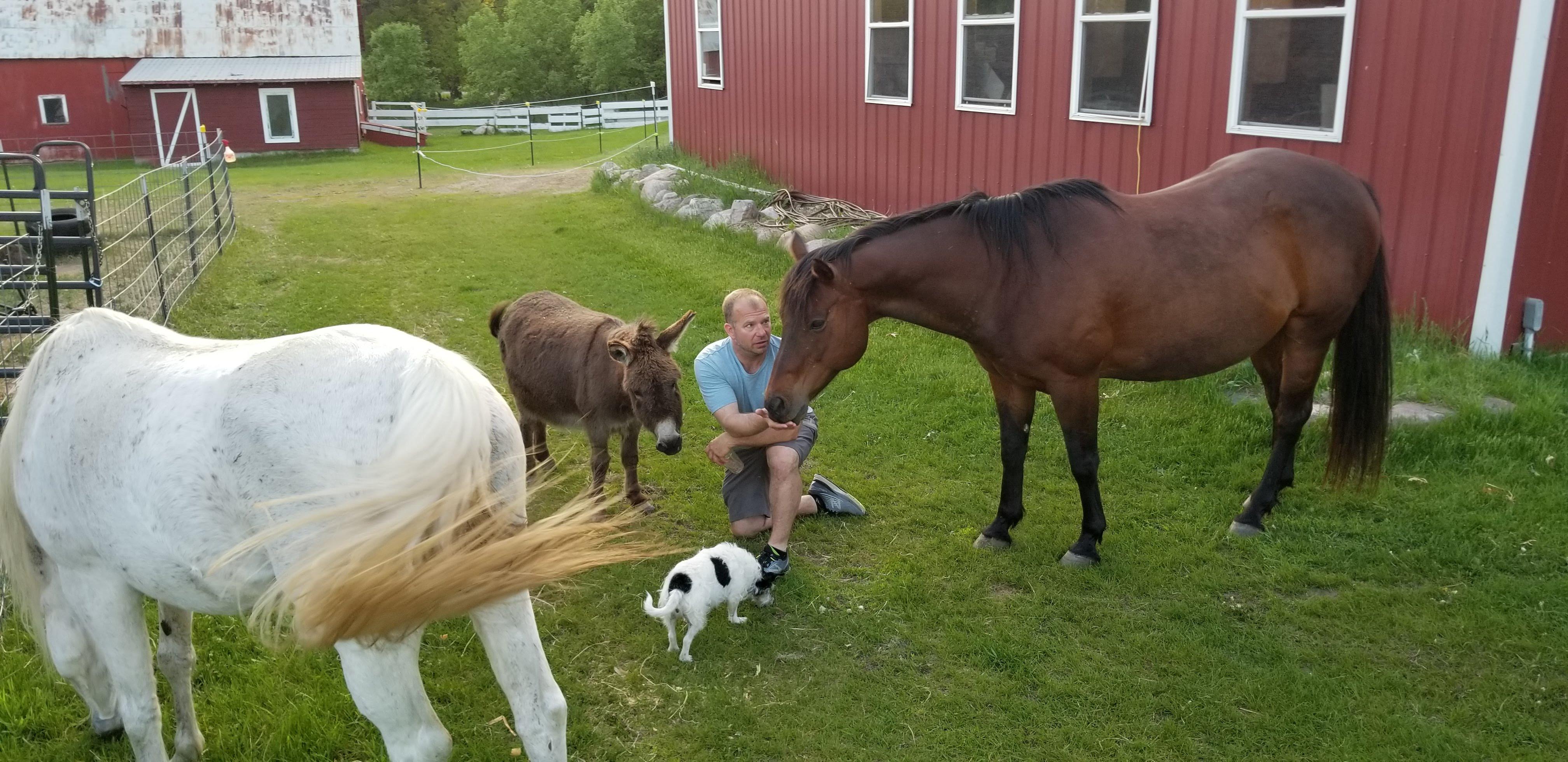 Matt sharing an outdoor animal experience with young people